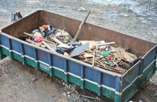 Professional muck removal service in action at a construction site in Finsbury Park.