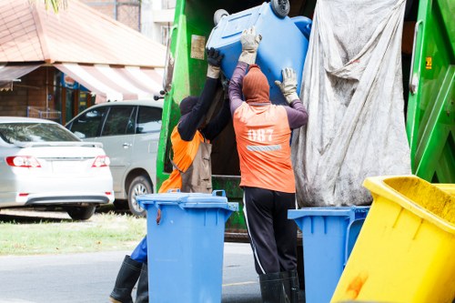 Professional waste disposal team at work